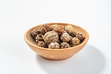 Chinese food commonly used spicy cooking seasoning spices, a dish of cardamom on a white background