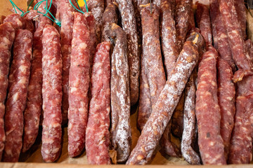 Variety of dried sausages in a basket