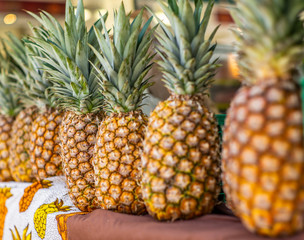 Ripe pineapples at a market stall in Bern, Switzerland in summer