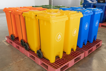 Different colored bins placed in the shop, Trash Shop,.There are many types of trash cans.
