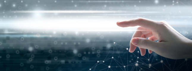 Young woman hand touching digital technology and network connection with copy space