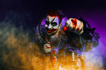 clown with lantern