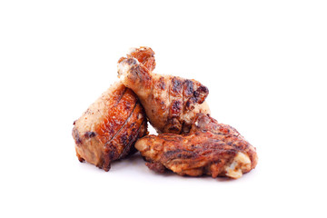 fast food grilled chicken   legs to a crust  on a white background isolated 