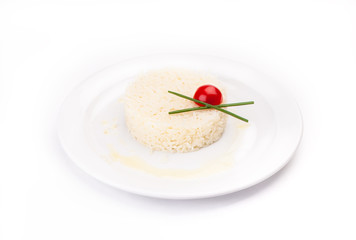 Rice dish with tomato and lettuce.