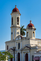 Fototapeta na wymiar Colonial architecture in the Jose Marti Park in Cienfuegos, Cuba