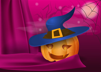 the pumpkin in the witchs hat lies among the fabric draperies in the background of the cemetery