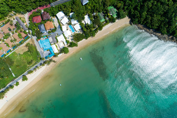 Beautiful sea surface with seashore and modern villa image by Drone aerial view Top down