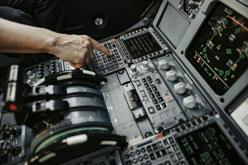 Caucasian man working in cabin of airliner