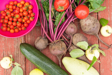 still life fresh fruits and vegetables on a wooden table top view