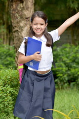 Successful School Girl With Notebooks