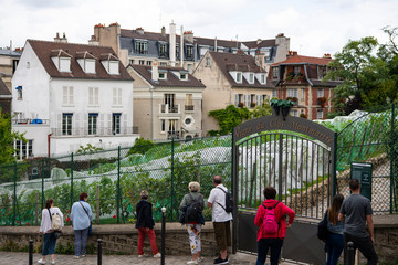 Fototapeta na wymiar France, Paris, August, 16-2019, Tourists visiting Montmartre district