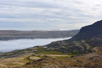 Fototapeta na wymiar Magic foggy morning and beautiful view of lava fields, Iceland, Europe.
