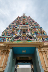 Sri Mahamariamman Temple main tower with colorful figures in Kuala Lumpurs oldest Hindu temple