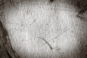 Scratched dirty dusty copper plate texture, black and white image.