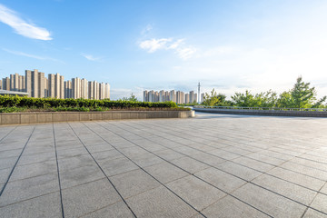 city skyline with empty square