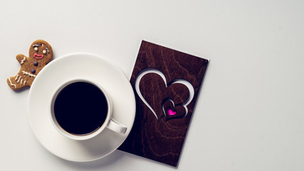  Coffee with a cute cookie and a love card on a white background