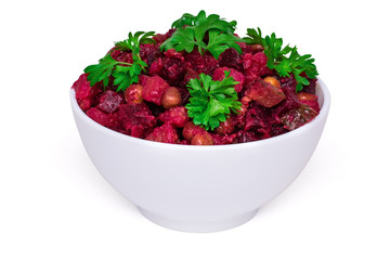 Traditional russian vegetarian salad vinaigrette decorated with parsley. Isolated, cutout