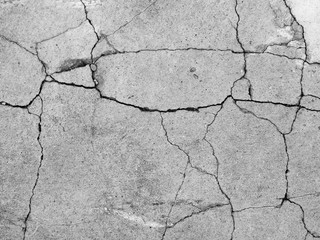 Cracked concrete texture closeup background