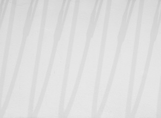 Obraz premium abstract shadow of fence on white wall background