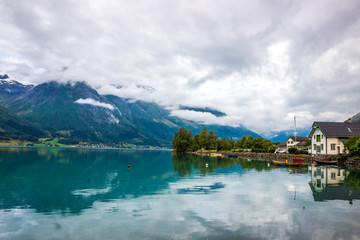 clouds over Oppstryn lake in Hjelle in Norway