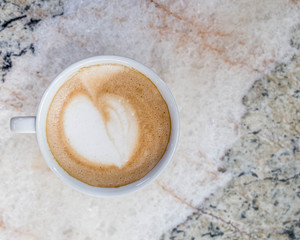 Italian cappuccino coffee cup on marble table surface