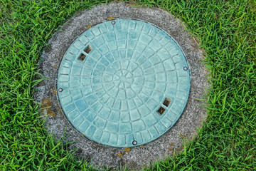 Manhole cover on the construction site