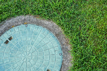 Manhole cover on the construction site
