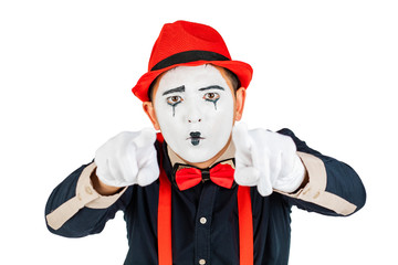 A MIME artist does tricks with his hands. Funny MIME show, a talented actor. Isolated on white...