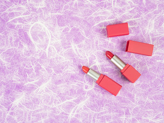 Colorful lipsticks on Makeup table.