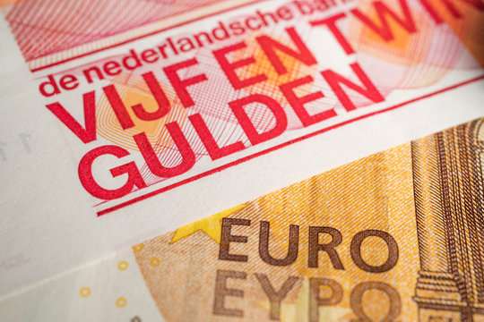 Fifty Euro and Twenty Five Guilders bill on top of each other to show the exchange between the two currencys