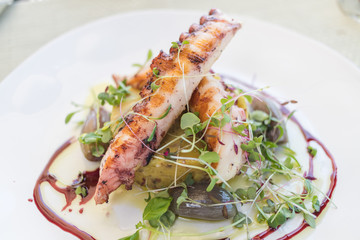 Grilled octopus and sweet potato mash