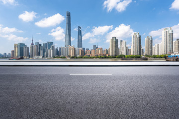 empty road with city skyline