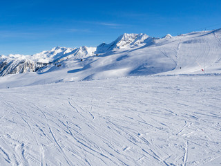 COURCHEVEL, FRANCE - January 2018: Amazing view of snow covered Courchevel slope in French Alps. Ski Resort Courchevel
