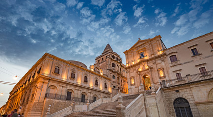 baroque church of S. Francesco d'Assisi and monastery of S. Salvatore at sunset, in Noto in Sicily,...