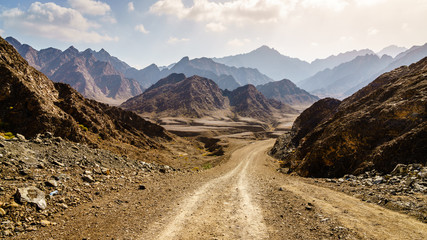 Dirt road in Hajar mountains in Dubai, UAE - Powered by Adobe