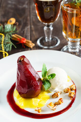 Poached pears in red wine with cinnamon and anise