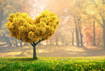 a fantasy landscape with yellow autumn tree