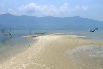 Island beach, landscape with mountains and sea 