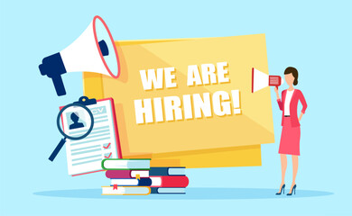 Business woman speaking through megaphone recruiting new employees.