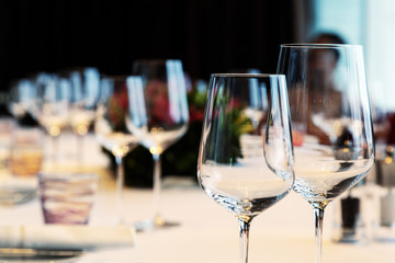 red wine glass on dinner table with friendship
