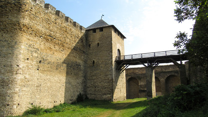 Obraz premium Main gate and bridge of Khotyn fortress (fortification complex located on the right bank of the Dniester River in Khotyn, Chernivtsi Oblast (province) of western Ukraine). 06.08.2019