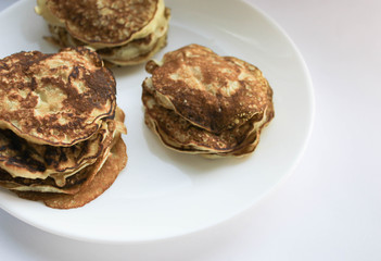 Fototapeta na wymiar Pancakes on a white plate