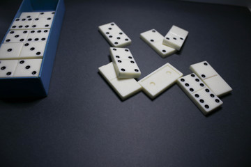 Dominoes on a gray background