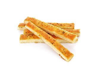 Garlic and herb bread slices on white background.