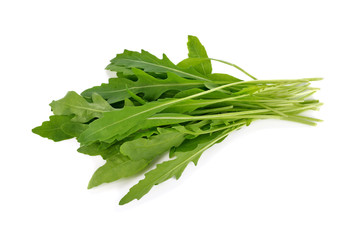 Sweet rucola salad or rocket lettuce leaves isolated on white ba