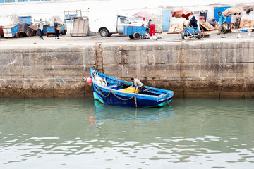 Fototapeta na wymiar Blue boat Essaouira village, Morocco 