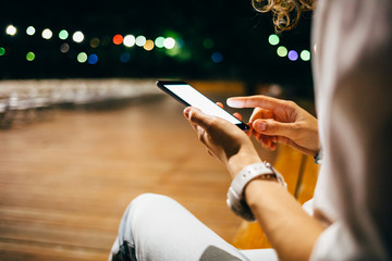 Young woman using mobile phone