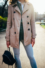 Unrecognizable stylish young woman