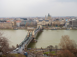 The Széchenyi Chain Bridge is a suspension bridge that spans the River Danube between Buda and Pest, the western and eastern sides of Budapest, the capital of Hungary.
