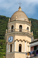 Fototapeta na wymiar Vernazza village, close-up of the bell tower of the church of Santa Margherita di Antiochia. Cinque Terre, UNESCO world heritage site, La Spezia, Liguria, Italy, Europe.